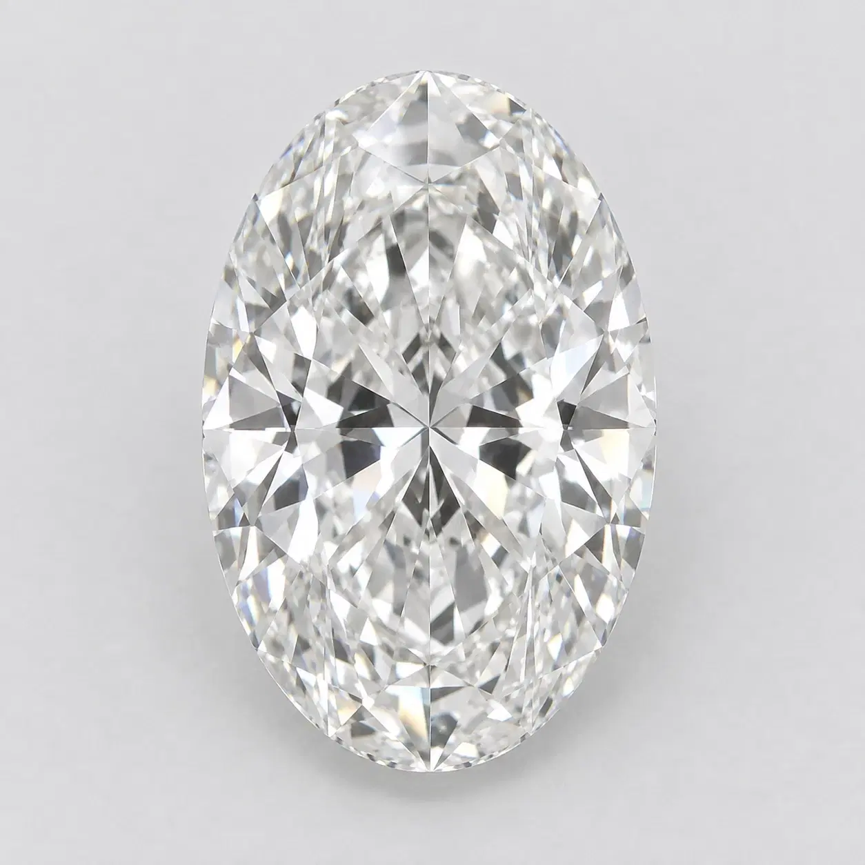 Loose oval lab-grown diamond viewed face-up.